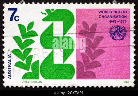 AUSTRALIEN - UM 1973: Eine in Australien gedruckte Briefmarke zeigt Stylized Caduceus und Laurel, WHO, 25. Jahrestag, um 1973 Stockfoto