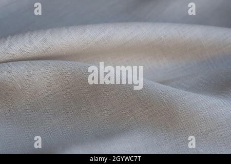 Weiche Leinenstruktur. Strukturierter Stoffhintergrund. Makro mit flachem freiheitsgrad Stockfoto