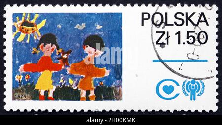 POLEN - UM 1979: Eine in Polen gedruckte Briefmarke zeigt Children in Meadow, Internationales Jahr des Kindes, um 1979 Stockfoto