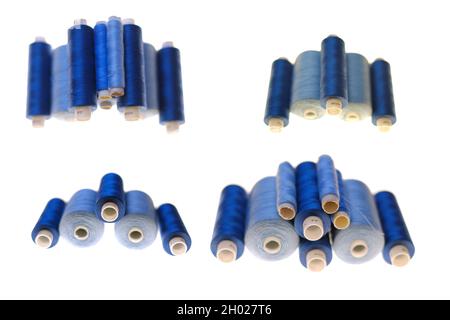 Nähgarne Set.Blaue und graue Fadenspulen isoliert auf weißem Hintergrund. Fadencollage .Needlework und Nähen.Hobby und Handwerk Stockfoto