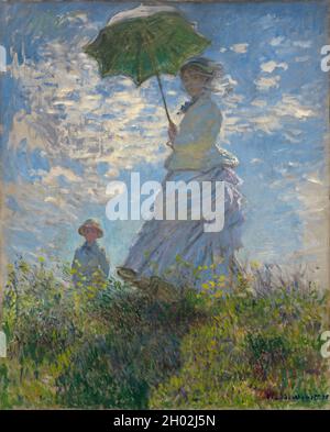 Frau mit Sonnenschirm - Madame Monet und ihr Sohn (1875) von Claude Monet Stockfoto