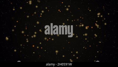 Bild von warm glühenden gelben Sternen und orangefarbenen Flecken auf schwarzem Hintergrund Stockfoto