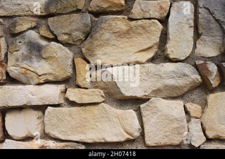 Eine Wand aus weißem Sandstein Stockfoto