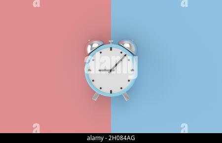 Wecker auf einem rosa und blauen geometrischen Hintergrund Stockfoto