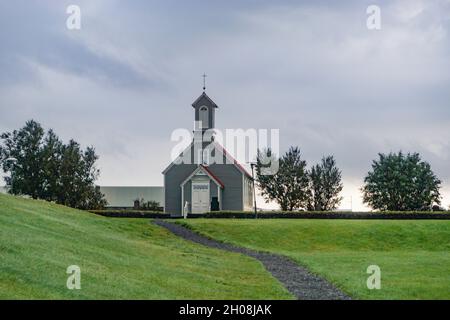 Reykholt, Island: Die alte Kirche (1886-1887) in Snorrastofa, das Gehöft des isländischen Saga-Schriftstellers Snorri Sturluson (1179–1241). Stockfoto