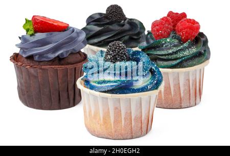 Gruppe von Cupcakes mit farbigen Belag isoliert auf weißem Hintergrund Stockfoto