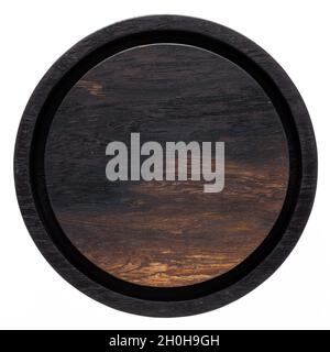 Zweifarbiger, runder Teetablett aus Holz. Rundes Hackbrett aus Holz. Textur von alten Holzplanken. Stockfoto