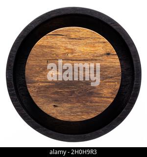 Zweifarbiger, runder Teetablett aus Holz. Rundes Hackbrett aus Holz. Textur von alten Holzplanken. Stockfoto