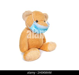 Teddybär in einer medizinischen Maske. Stockfoto