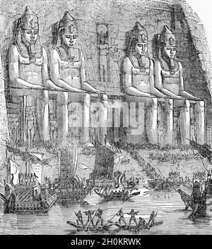 Eine Illustration von Abu Simbel aus dem späten 19. Jahrhundert sind zwei massive Felsentempel im Dorf Abu Simbel in Oberägypten am Ufer des Nils. Zwillingstempel, wurden sie ursprünglich aus dem Berghang im 13. Jahrhundert v. Chr., während der 19. Dynastie Herrschaft des Pharao Ramses II., geschnitzt Sie dienen als ein dauerhaftes Denkmal für den König Ramses II. Seine Frau Nefertari und seine Kinder sind in kleineren Zahlen an seinen Füßen zu sehen, die als von geringerer Bedeutung angesehen werden und nicht die gleiche Position der Skala erhalten haben. Stockfoto