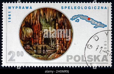 POLEN - UM 1980: Eine in Polen gedruckte Briefmarke zeigt Höhlen (Expedition 1961), Karte von Kuba, um 1980 Stockfoto