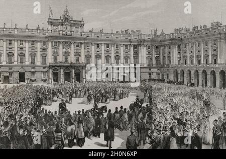 Alfonso XII (1857-1885). König von Spanien. Mercedes von Orléans (1860-1878). Die Hochzeit von König Alfonso XII. Mit Infantin Mercedes von Orléans wurde am 23. Januar 1878 gefeiert. Königliche Feierlichkeiten in Madrid anlässlich der Veranstaltung. Vergleiche aus den Provinzen, die am Nachmittag des 27. Januar auf dem Armería-Platz in Anwesenheit des Königs und der Königin Tänze aus ihrer Heimat aufführen. Gravur von Rico. La Ilustración Española y Americana, 1878. Stockfoto