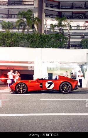 Red Ferrari Monza SP2 supercar parked at a luxury restaurant in central Monaco. Stockfoto