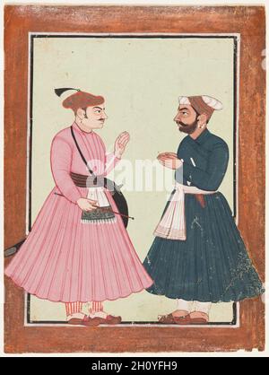 Eine edle, wahrscheinlich Raja Gaur Sen, erhält eine weitere edle, c. 1700-20. Nordindien, Himachal Pradesh, Pahari Königreich Mandi. Farbe auf Papier; Seite: 19.8 x 14.8 cm (7 13/16 x 5 13/16 Zoll); Bild: 16.4 x 14.8 cm (6 7/16 x 5 13/16 Zoll). Zwei Adlige in königlicher Kleidung grüßen einander. Der Mann in einem kiefergrünen Jama faltet seine Hände in Flehen zu dem Mann, der in einer mauvigen Robe gekleidet ist. Der Mann auf der linken Seite ist wahrscheinlich ein raja, da er seinen Turban mit einer königlichen Wolke schmückt und seine Hand hebt, um den anderen zu segnen. Stockfoto