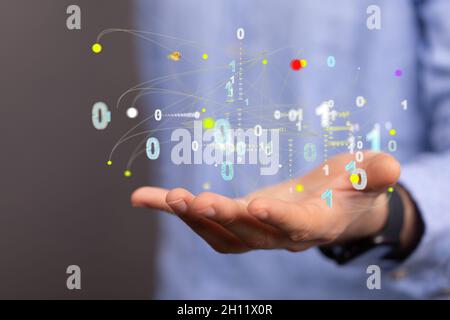 Illustration von Binärcodes in einer menschlichen Hand Stockfoto