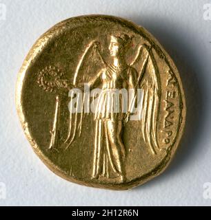 Stater: Geflügelte Nike Holding einen Kranz und Standard (Rückwärtsfahrt), 336-323 v. Chr.. Griechenland, Mazedonien, 4. vorchristlichen Jahrhundert. Gold, Durchmesser: 1,9 cm (3/4 in.). Stockfoto