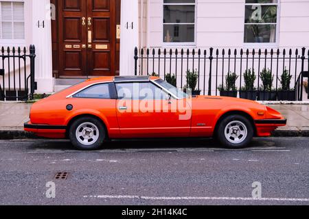 Datsun 280ZX (Nissan S130) Sportcoupé von Nissan Japan, auch Nissan Fairlady Z und 280Z genannt, geparkt in einer Londoner Straße, Belgravia London Stockfoto