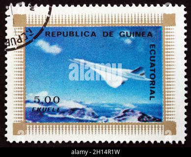 ÄQUATORIALGUINEA - UM 1976: Eine in Äquatorialguinea gedruckte Marke zeigt Concorde, Flugzeug, um 1976 Stockfoto