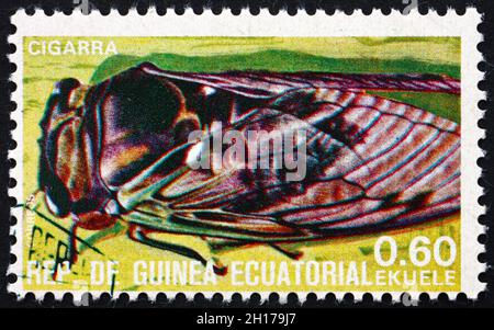 ÄQUATORIALGUINEA - UM 1978: Eine in Äquatorialguinea gedruckte Marke zeigt Grasshopper, Insect, um 1978 Stockfoto