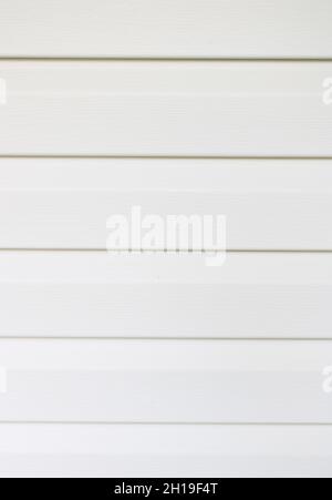 Ein Beispiel für Light Tan Vinyl House Siding Stockfoto