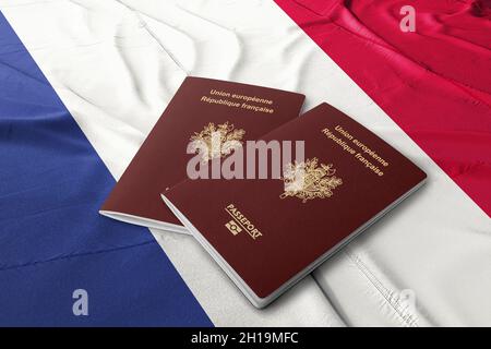 Frankreich-Pass auf der französischen Flagge, französischer Pass ist ein Identitätsdokument, das an französische Bürger ausgestellt wurde. Stockfoto