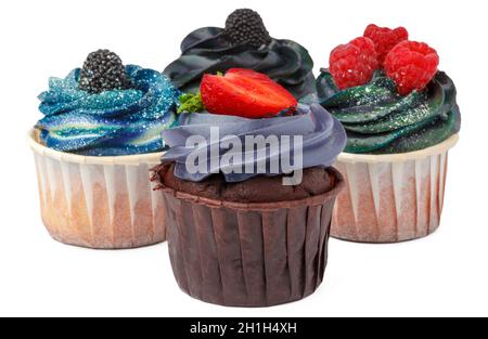 Gruppe von Cupcakes mit farbigen Belag isoliert auf weißem Hintergrund Stockfoto