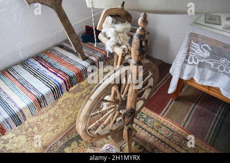 Alten Spinnrocken des Anfangs des 20. Augenlids. Spinning-Lager. Stockfoto