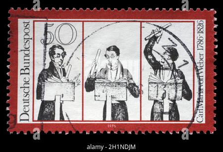 Briefmarke gedruckt in der DDR zu Ehren von Carl Maria von Weber, zeigt Musiker, um 1976 Stockfoto