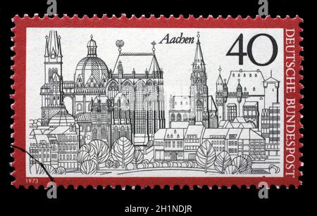 Die in Deutschland gedruckte Marke aus der Tourismusausgabe zeigt Aachen, um 1973. Stockfoto