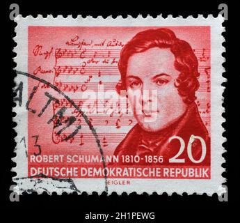 Briefmarke gedruckt in DDR zeigt Robert Schumann (1810-1856) (Musik von Schubert), Komponist, Hundertjahrfeier des Todes, ca. 1956 Stockfoto