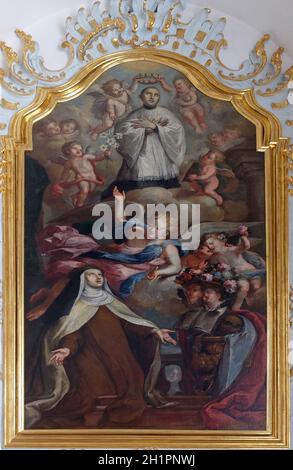 St. Maria Magdalena de Pazzi mit St. Aloysius kniend auf einer Wolke, Saint Aloysius Gonzaga altar Jesuitenkirche St. Franz Xaver in Luzern, Schweiz. Stockfoto