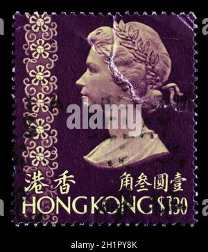 Gedruckt in Hong Kong Stempel zeigt ein Porträt von Königin Elizabeth II, ca. 1973. Stockfoto