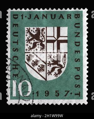 Briefmarke gedruckt in Deutschland, zeigt Saar Wappen, um 1957 Stockfoto