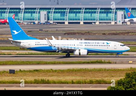 Guangzhou, China - 24. September 2019: XiamenAir Boeing 737-800-Flugzeug auf dem Flughafen Guangzhou Baiyun (CAN) in China. Stockfoto