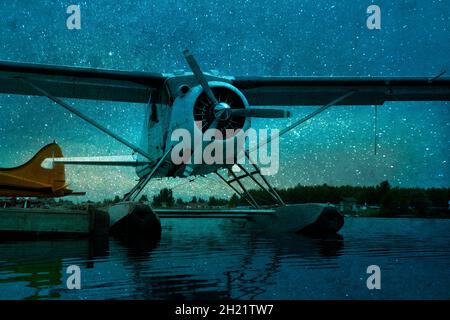 Künstlerische Darstellung eines in Anchorage Alaska unter einem Sternenhimmel angedockten Wasserflugzeugs Stockfoto