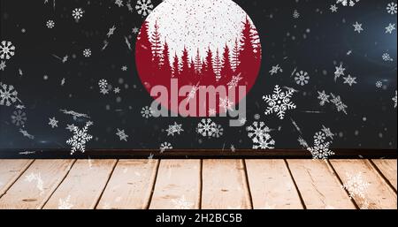 Bild von Schnee fällt über Kugel auf schwarzem Hintergrund Stockfoto