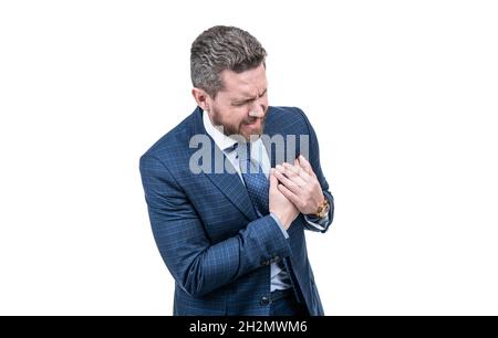 Herzsymptome, die Sie nicht ignorieren sollten. Der Direktor leidet unter Brustschmerzen. Plötzlicher Herzinfarkt Stockfoto