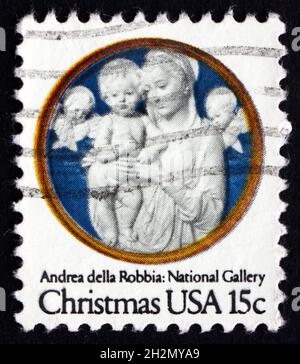 USA - UM 1978: Eine in den USA gedruckte Briefmarke zeigt Madonna mit Kind mit Cherubim, von Andrea della Robbia, Weihnachten, um 1978 Stockfoto