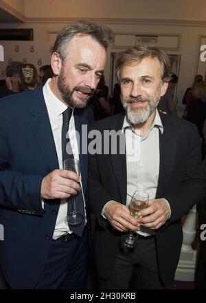 John Berry (ENO Artistic Director) und Christoph Waltz bei der Eröffnungsnacht nach der Party von ENO's Benvenuto Cellini unter der Regie von Terry Gilliam im London Coliseum, St Martin's Lane - London Stockfoto