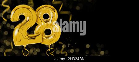 Goldene Luftballons mit Kopierraum - Nummer 28 Stockfoto