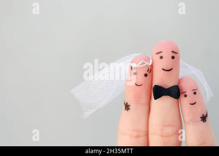 Finger Kunst des glücklichen Paares zu heiraten. Das Konzept von Stiefsohn ist Freude über die Hochzeit. Stockfoto