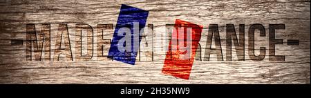 „Made in France“-Schriftzug auf Holzhintergrund Stockfoto