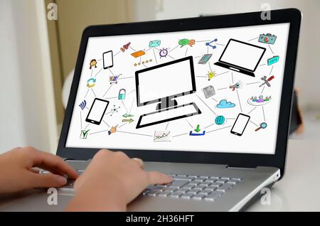 Hands on a Laptop with screen showing Network communication concept Stockfoto