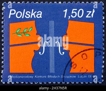 POLEN - UM 1979: Eine in Polen gedruckte Briefmarke, die Henryk Wieniawski Young Geigenists’ Competition, Lublin, um 1979 gewidmet ist Stockfoto