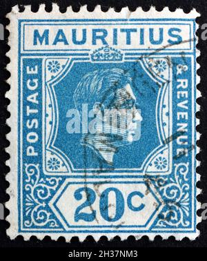 MAURITIUS - UM 1938: Eine in Mauritius gedruckte Briefmarke zeigt König Georg VI., um 1938 Stockfoto