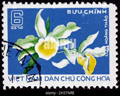 VIETNAM - UM 1976: Eine in Vietnam gedruckte Marke zeigt Lan Hoang Thao Orchid, um 1976 Stockfoto