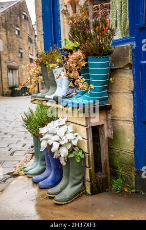 Wellington Stiefel als Pflanztöpfe umfunktionierten, Großbritannien Stockfoto