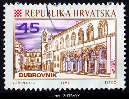 ZAGREB, KROATIEN - 1. NOVEMBER 2018: Eine in Kroatien gedruckte Marke zeigt den Rektorenpalast, Dubrovnik, kroatische Stadt, um 1993 Stockfoto