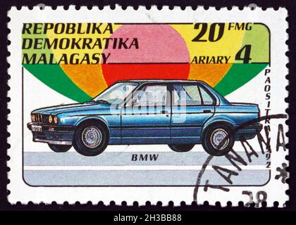 MALAGASY - UM 1993: Eine auf Madagaskar gedruckte Marke zeigt BMW, Automobil, um 1993 Stockfoto