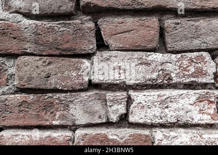 Rote Backsteinmauer - Textur von alten dunkelbraunen und roten Backgorund Backgorund mit weißen Pinselstrichen Stockfoto